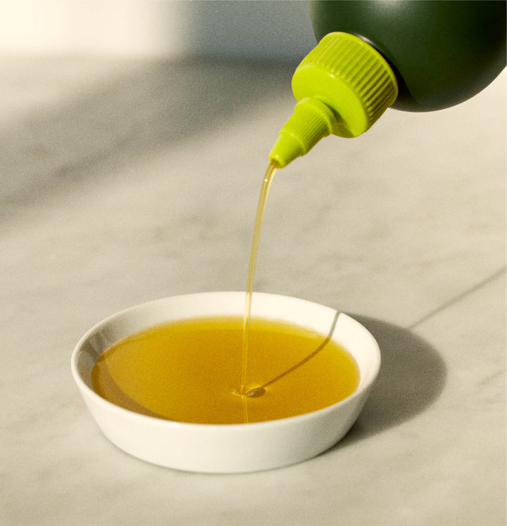 Olive Oil Being Poured